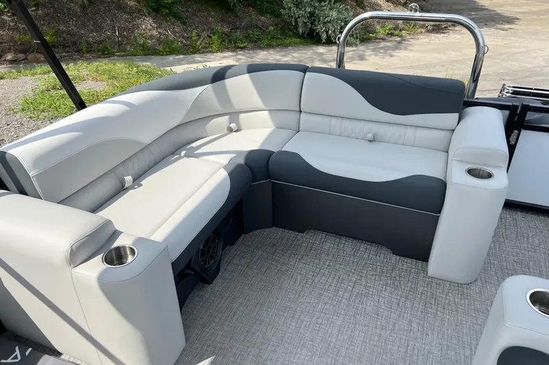 Slide: The Image of Luxurious seating on 2026 Tahoe TRITOON 2185 boat with cup holders and stylish upholstery. - 9