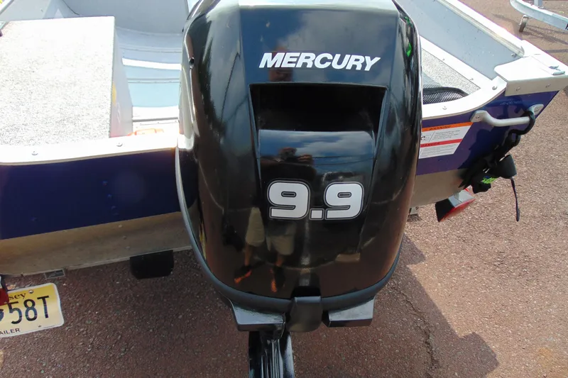 Slide: The Image of 2022 Crestliner 1261 Outreach boat with Mercury 9.9 outboard motor. - 5