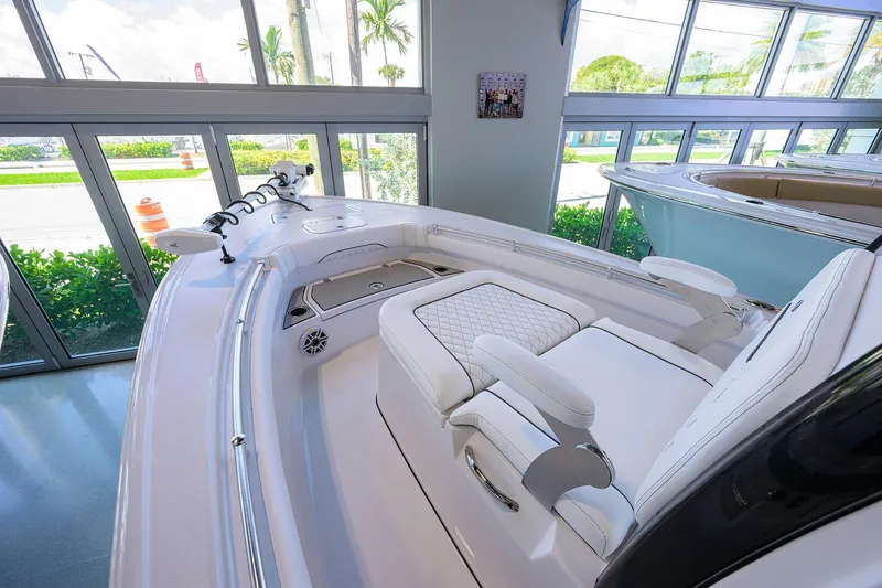 Slide: The Image of 2026 Sportsman Masters 247OE Bay Boat interior with luxurious seating and modern design. - 11