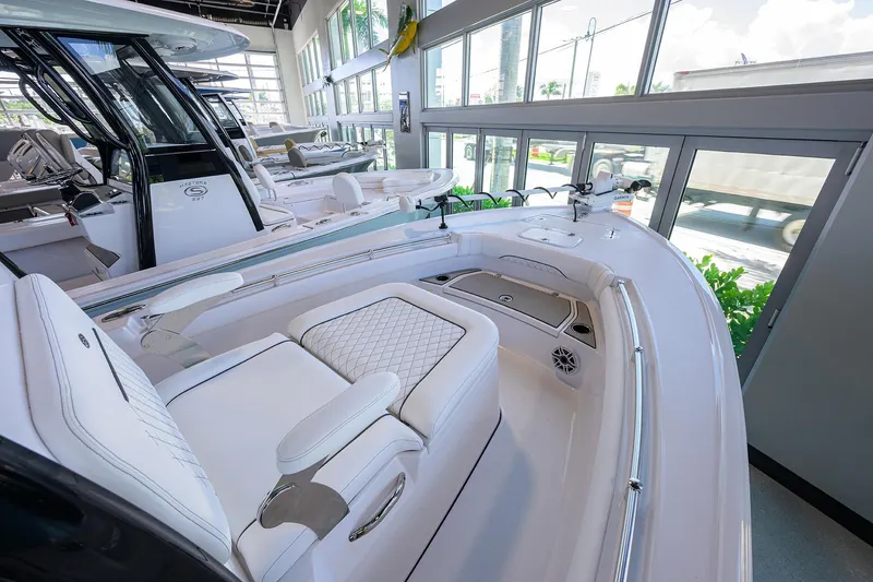 Slide: The Image of 2026 Sportsman Masters 247OE Bay Boat interior with luxurious seating and modern design. - 12