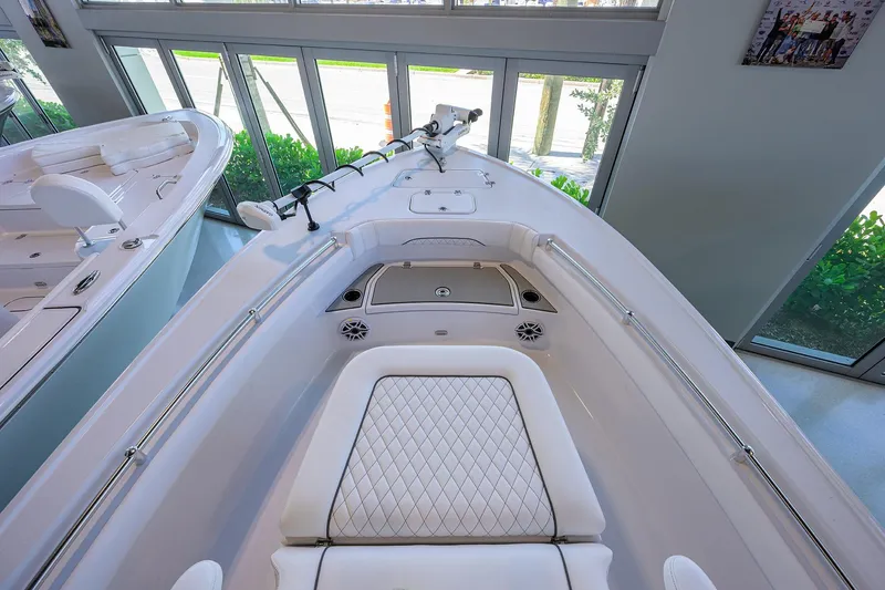 Slide: The Image of 2026 Sportsman Masters 247OE Bay Boat interior with sleek design and comfortable seating. - 13