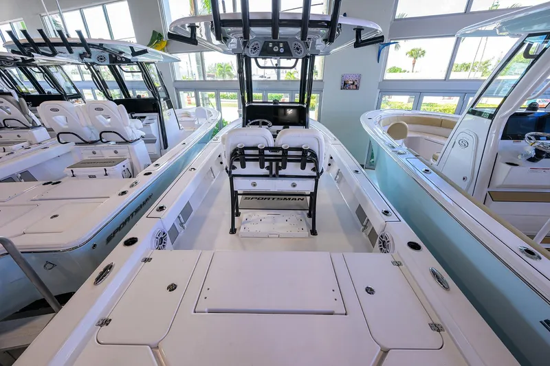 Slide: The Image of 2026 Sportsman Masters 247OE Bay Boat interior, showcasing seating and console features. - 19