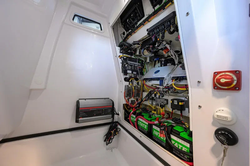 Slide: The Image of Electrical system of 2026 Sportsman Masters 247OE Bay Boat, featuring batteries and wiring. - 28