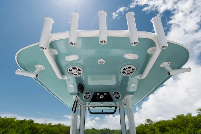 Slide: The Image of 2026 Sportsman Masters 247OE Bay Boat with Mercury 350 V10 engine in showroom. - 4