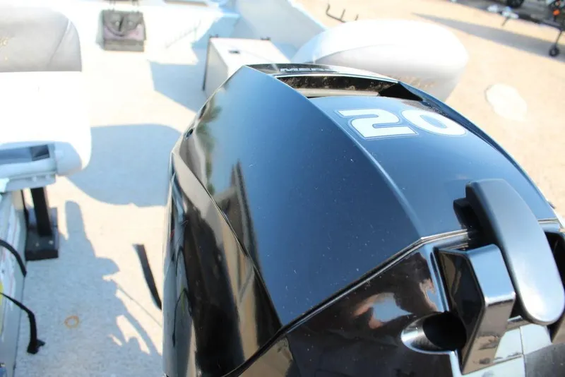 Slide: The Image of 2022 Alumacraft V14 boat with a 20 horsepower outboard motor, interior view. - 6