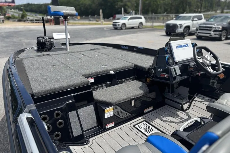 Slide: The Image of 2026 Bass Cat Puma STS boat interior with advanced navigation system and spacious seating. - 11