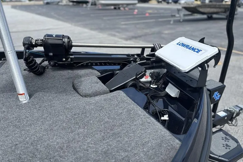 Slide: The Image of 2026 Bass Cat Puma STS boat with Lowrance electronics and trolling motor setup. - 15