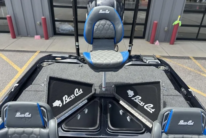 Slide: The Image of 2026 Bass Cat Puma STS boat interior with branded seats and storage compartments. - 16