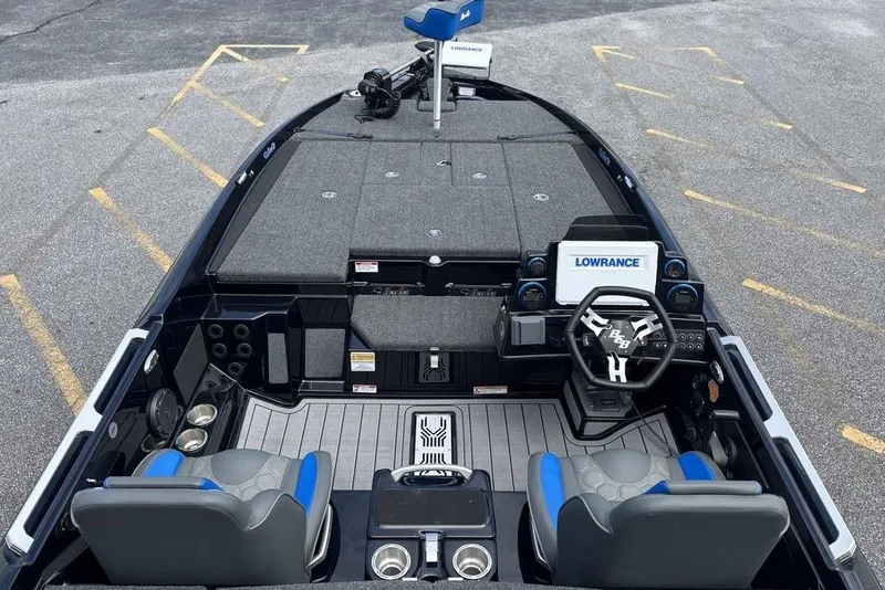 Slide: The Image of 2026 Bass Cat Puma STS boat interior with advanced navigation system and comfortable seating. - 19