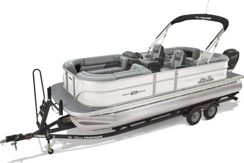 Slide: The Image of 2026 Sun Tracker Party Barge 22 DLX pontoon boat on trailer, side view. - 10