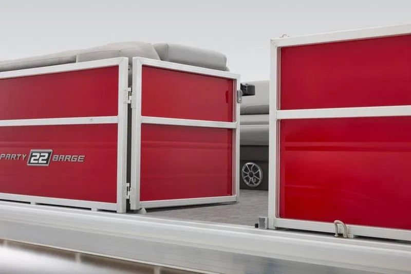 Slide: The Image of 2026 Sun Tracker Party Barge 22 DLX with red paneling and comfortable seating. - 12