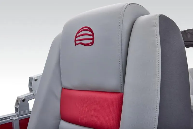 Slide: The Image of 2026 Sun Tracker Party Barge 22 DLX seat with red and gray upholstery. - 27