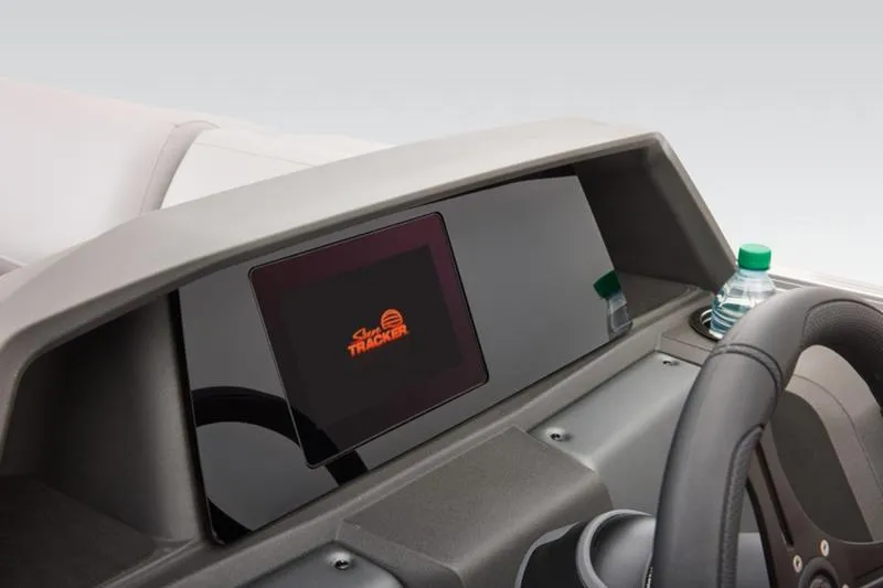 Slide: The Image of 2026 Sun Tracker Party Barge 22 DLX dashboard with touchscreen and cup holder. - 29