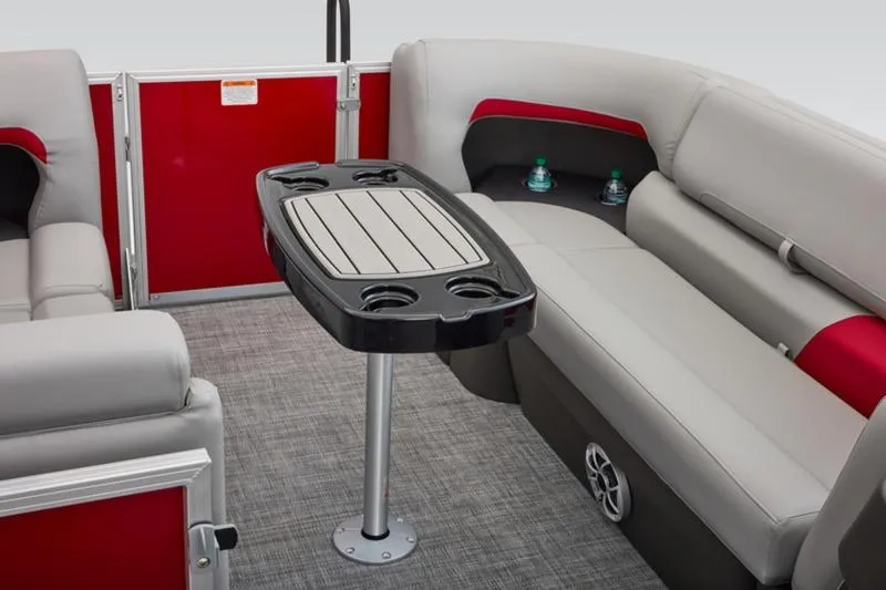 Slide: The Image of 2026 Sun Tracker Party Barge 22 DLX interior with seating and table. - 37