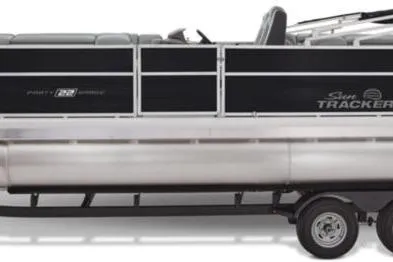 Slide: The Image of 2026 Sun Tracker Party Barge 22 DLX pontoon boat, side view on trailer. - 6
