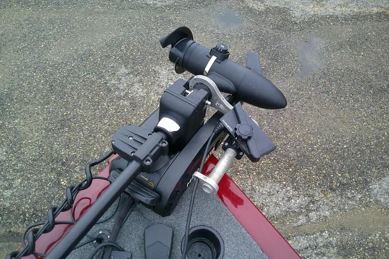 Slide: The Image of 2023 Tracker Pro Guide V-16 SC boat with mounted trolling motor. - 54