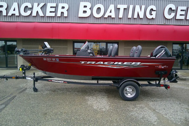 Slide: The Image of 2023 Tracker Pro Guide V-16 SC boat displayed at Tracker Boating Center. - 61