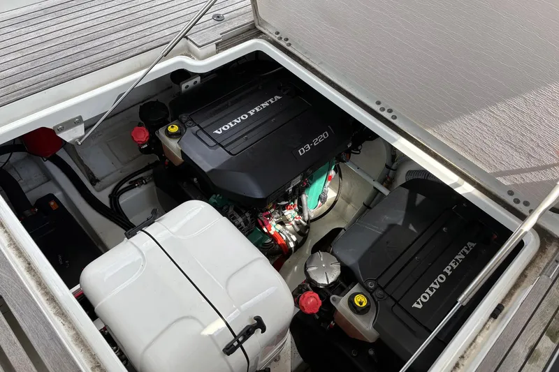 Slide: The Image of Engine compartment of 2019 Jeanneau NC 33 with Volvo Penta D3-220 engines. - 24