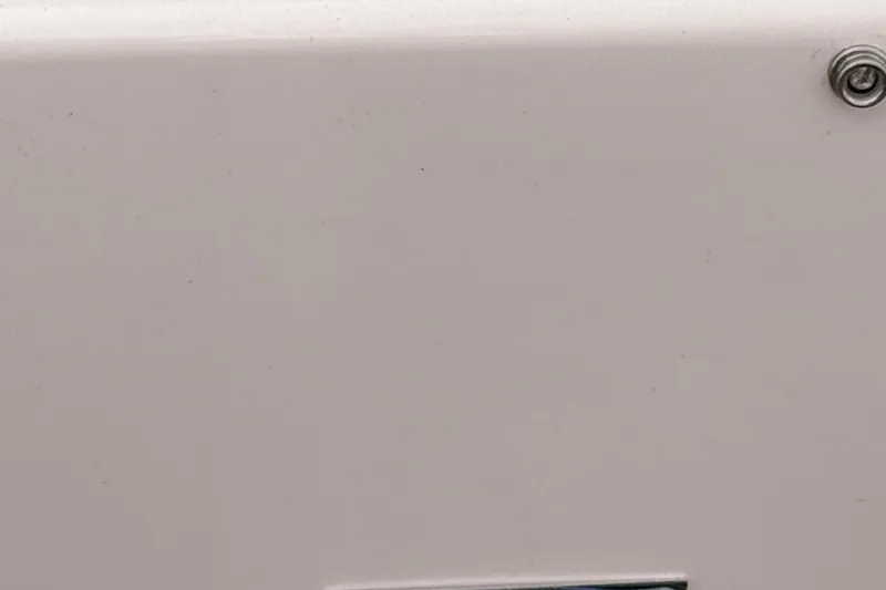 Slide: The Image of Close-up of a 2025 Ranger Tugs R-25 boat exterior detail. - 12