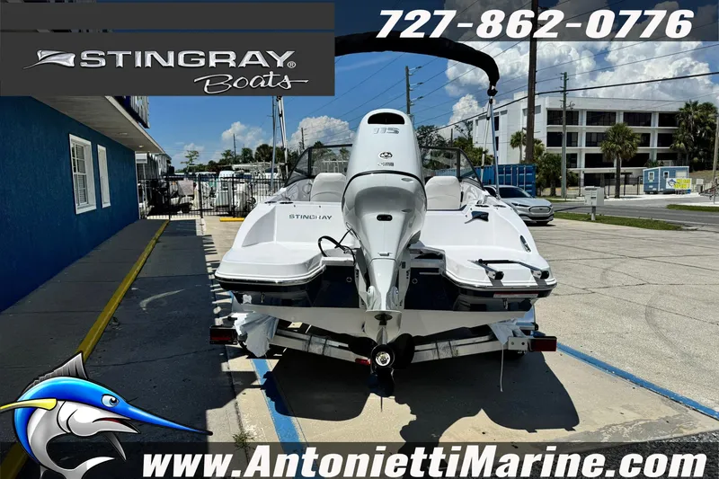 Slide: The Image of 2026 Stingray 191DC Dual Console boat displayed at Antonietti Marine dealership. - 2