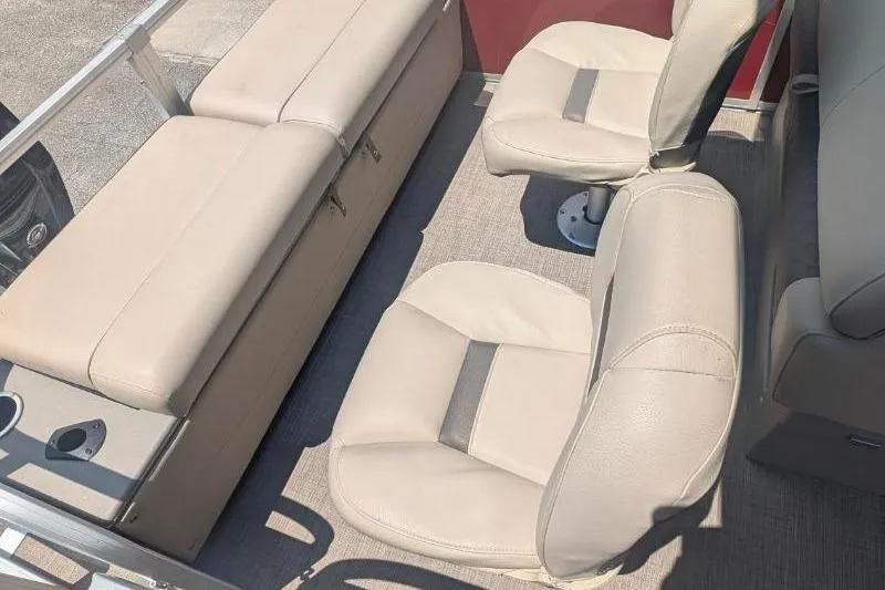 Slide: The Image of 2022 Sun Tracker SportFish 22 DLX interior seating with beige upholstery. - 5