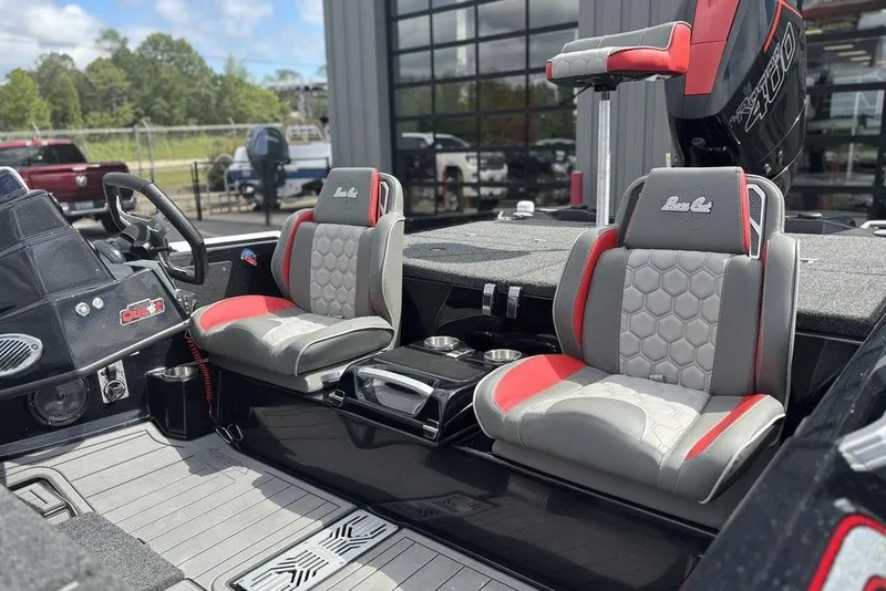 Slide: The Image of 2026 Bass Cat Jaguar STS boat interior with stylish seats and modern design. - 12