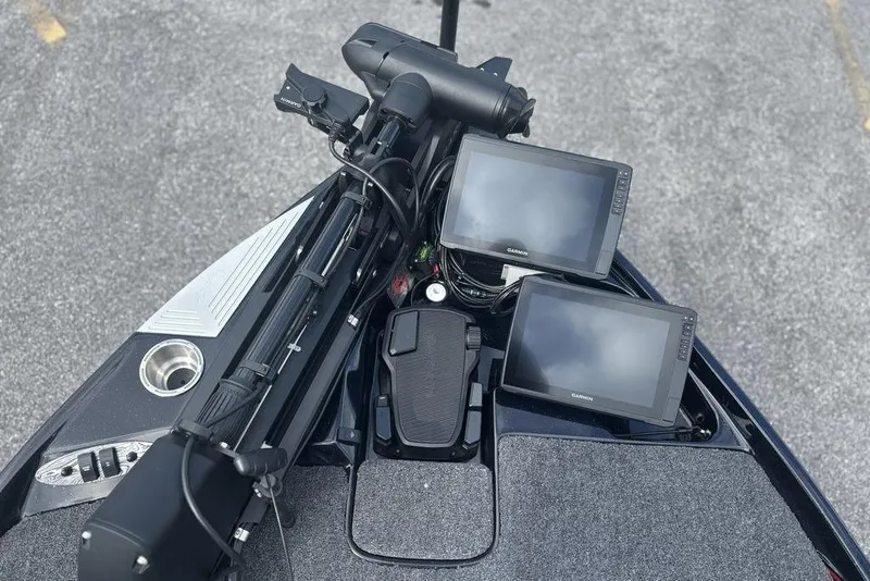 Slide: The Image of 2026 Bass Cat Jaguar STS boat with dual Garmin displays and trolling motor. - 15