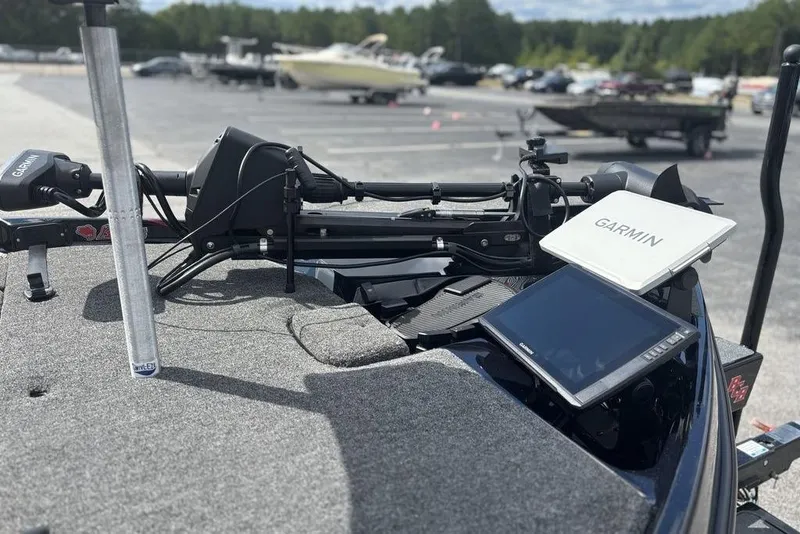 Slide: The Image of 2026 Bass Cat Jaguar STS boat with Garmin navigation system and trolling motor. - 16