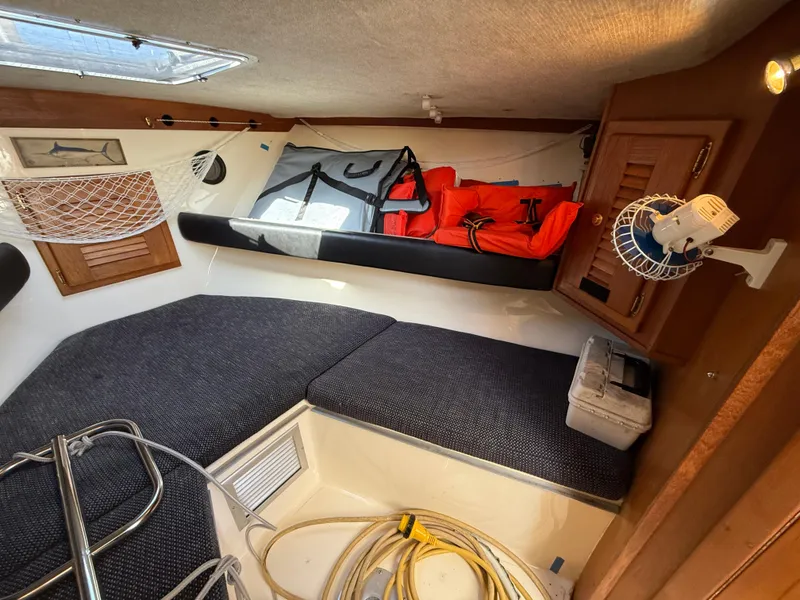 Slide: The Image of Interior of 2001 Albemarle 280 Express Sport Fisherman with storage and seating. - 24