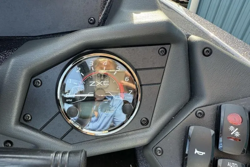 Slide: The Image of Tachometer of 2026 Skeeter ZXE20 boat dashboard, showing RPM gauge. - 16