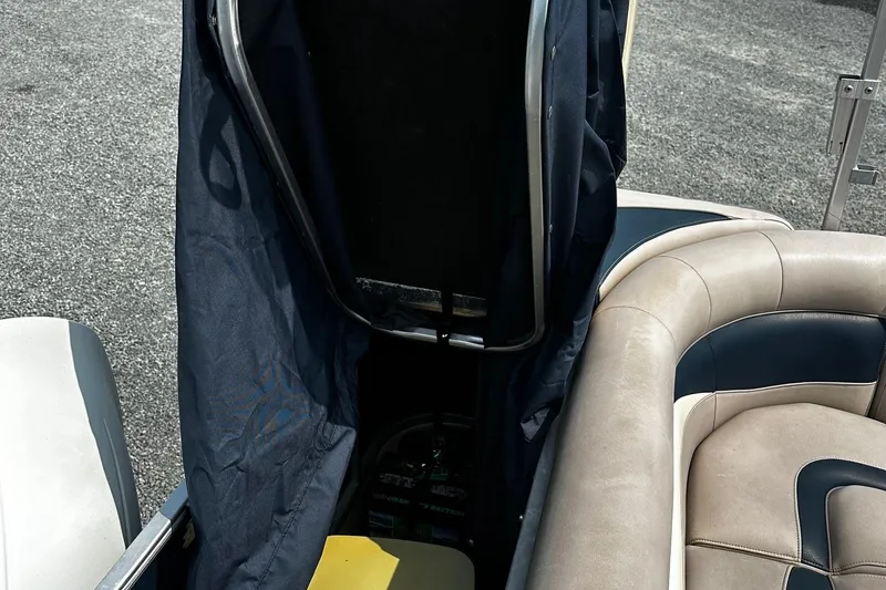 Slide: The Image of 2014 Godfrey Sweetwater 2286 Pontoon interior with seating and storage area. - 11