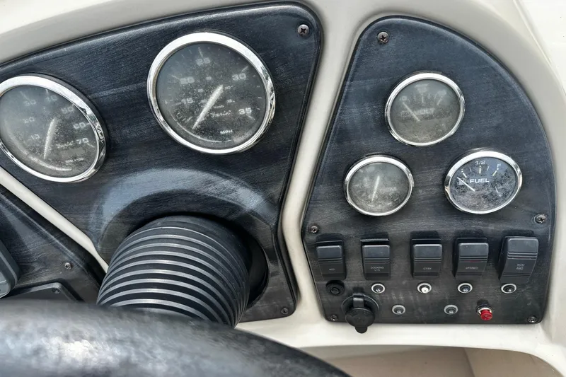Slide: The Image of Dashboard of a 2014 Godfrey Sweetwater 2286 Pontoon with gauges and switches. - 4