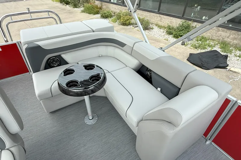 Slide: The Image of Luxurious seating area on 2026 Godfrey Sweetwater 2086 C pontoon boat with cup holders. - 10