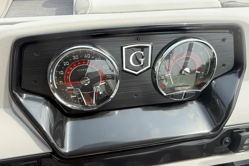 Slide: The Image of Dashboard of 2026 Godfrey Sweetwater 2086 C with speedometer and tachometer. - 13