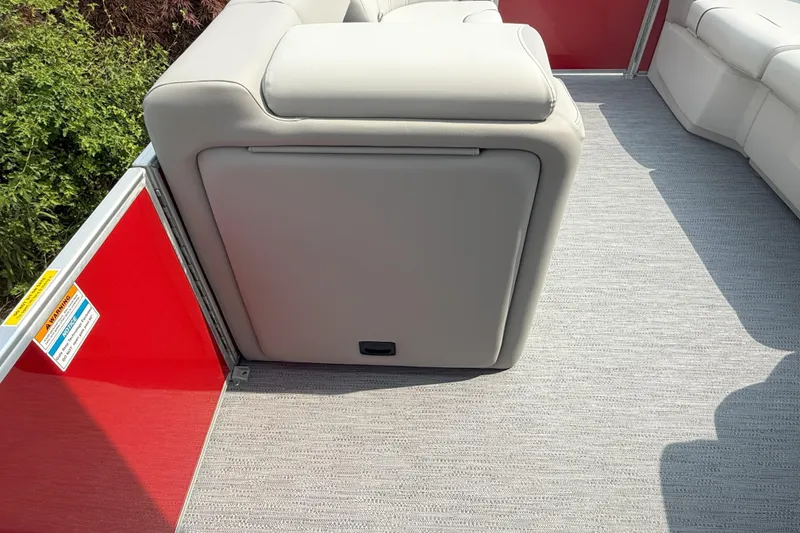 Slide: The Image of 2026 Godfrey Sweetwater 2086 C pontoon boat with beige seating and red paneling. - 17