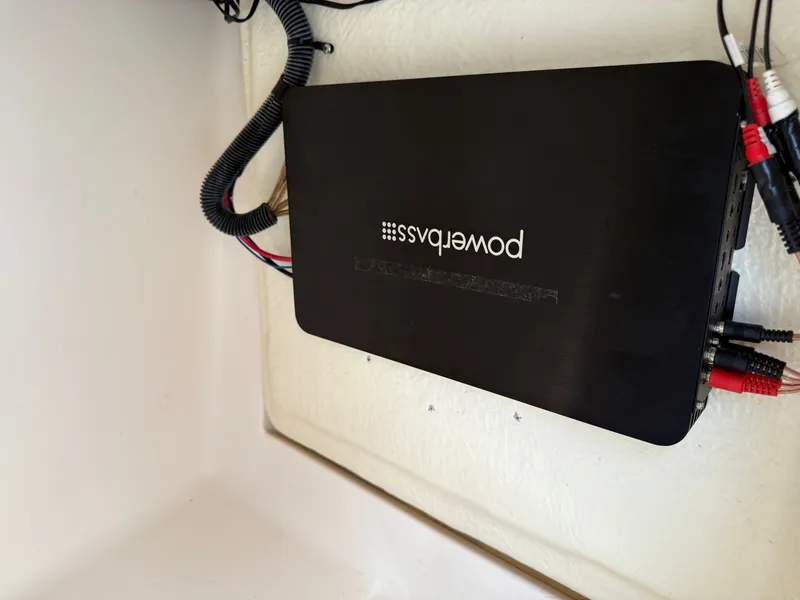 Slide: The Image of Powerbass audio amplifier installed in a 2012 Regal 2700 Bowrider boat. - 19