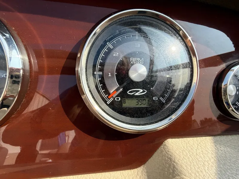 Slide: The Image of Tachometer of 2012 Regal 2700 Bowrider showing RPM and digital display. - 21