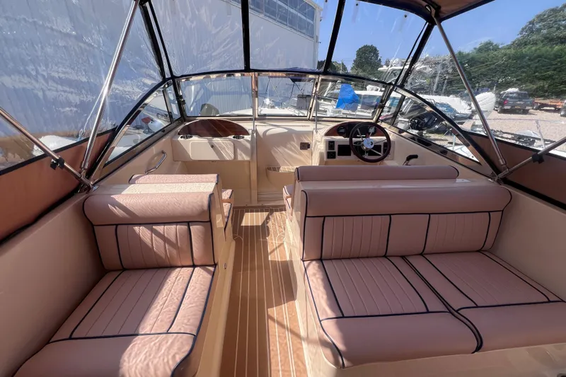 Slide: The Image of Luxurious interior of 2018 Rossiter 23 boat with plush seating and sleek design. - 14
