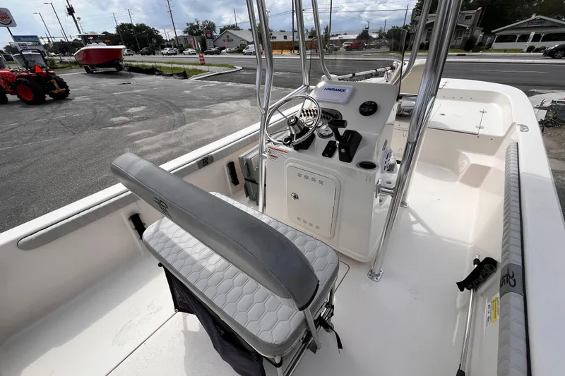 Slide: The Image of 2024 Carolina Skiff 21 LS boat interior with steering console and seating. - 8