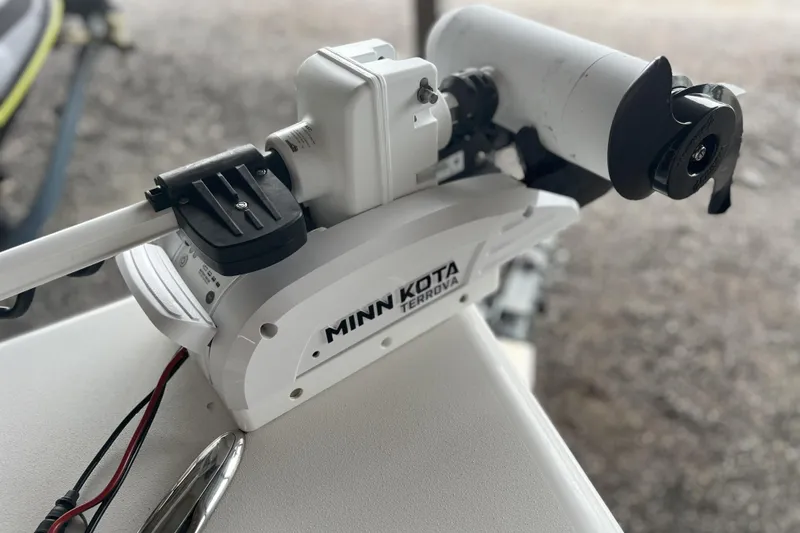 Slide: The Image of Minn Kota Terrova motor on 2023 Sea Pro 248 Bay boat, close-up view. - 15