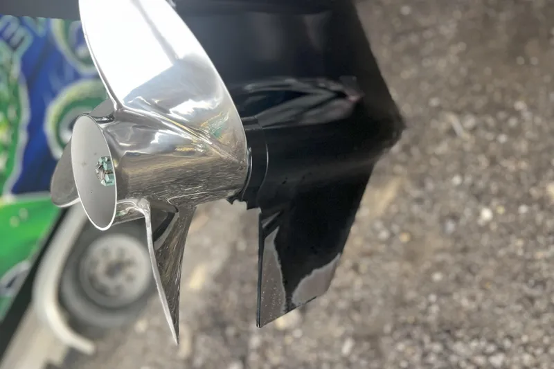 Slide: The Image of Close-up of a 2023 Sea Pro 248 Bay boat propeller, shiny and metallic. - 18