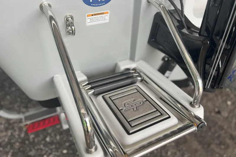 Slide: The Image of 2023 Sea Pro 248 Bay boat ladder with stainless steel rails and logo. - 20