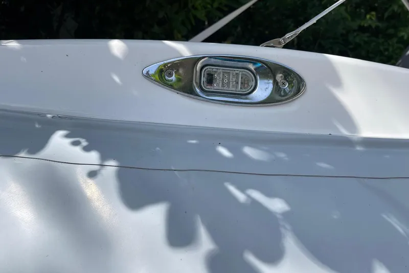 Slide: The Image of Close-up of Flexboat Flex 450's deck light with surrounding shadows. - 16