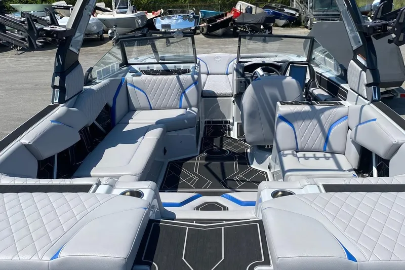 Slide: The Image of 2023 Tigé 24RZX boat interior with luxurious seating and modern design. - 7