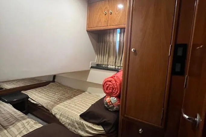 Slide: The Image of Bathroom interior of 2000 Carver 506 Motor Yacht with shower and porthole window. - 25