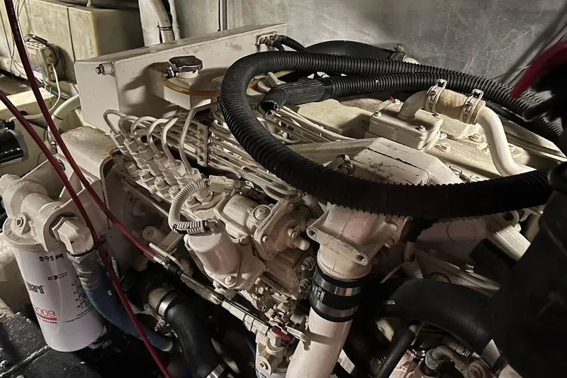 Slide: The Image of Cozy bedroom in 2000 Carver 506 Motor Yacht with round bed and porthole windows. - 31