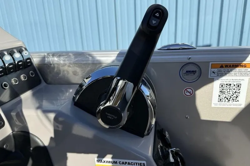 Slide: The Image of Throttle control of 2025 Barletta A20UC boat with warning label and QR code. - 15