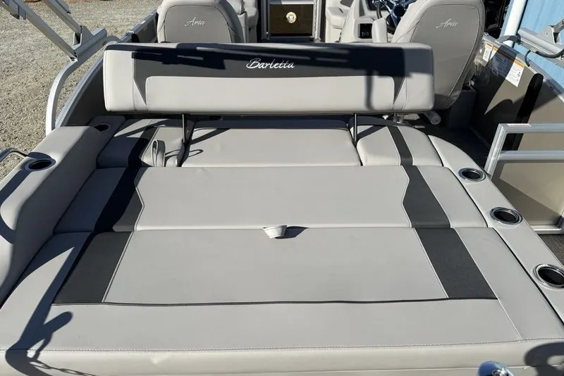 Slide: The Image of 2025 Barletta A20UC boat interior with gray seating and cup holders. - 21