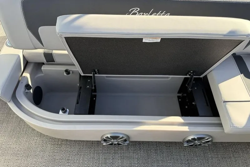 Slide: The Image of Open storage compartment in 2025 Barletta A20UC boat, showcasing spacious interior. - 23