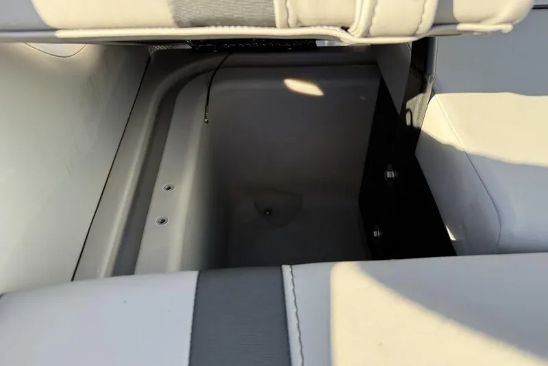 Slide: The Image of Storage compartment in 2025 Barletta A20UC boat, featuring cushioned seating. - 24